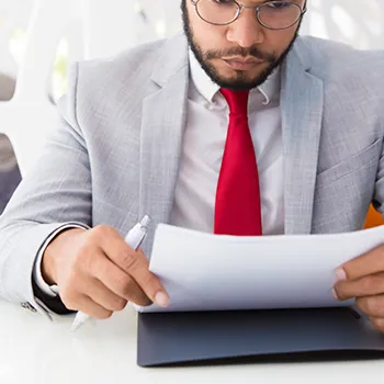 A man reading a file