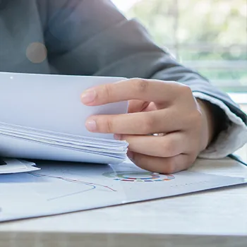 A woman checking papers