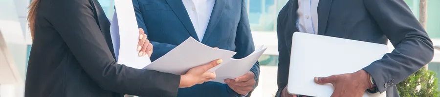 Three businessmen outdoors