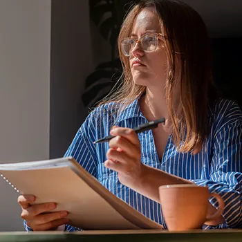 Serious woman thinking thoroughly