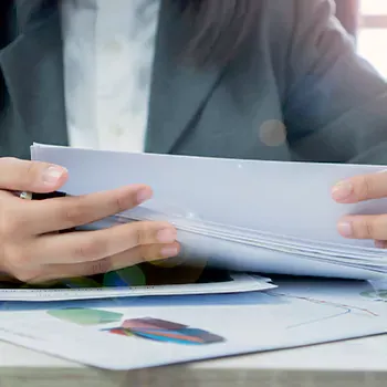 Woman organizing important work files