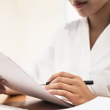 Woman reading an important document