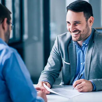 Happy person in business attire having a discussion