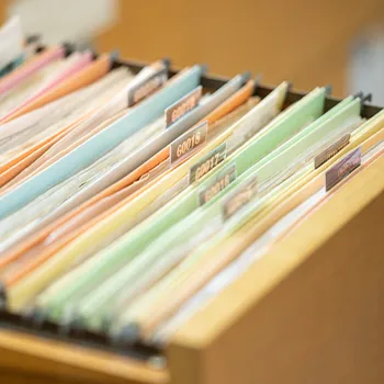 A drawer full of organized and important documents