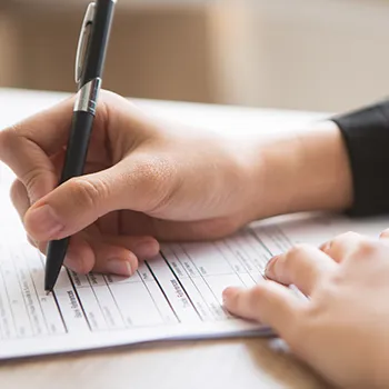 A woman answering registration form