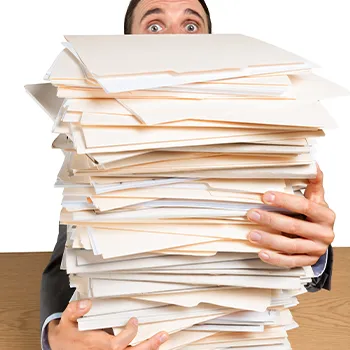 A man holding folders stacking