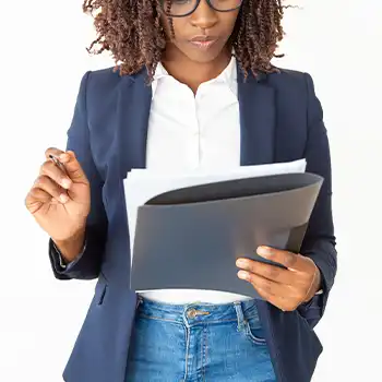 A woman reading what LLC articles of organization contain