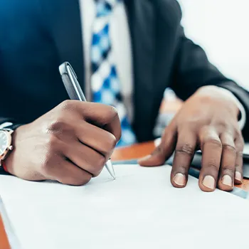 A business person writing close up image