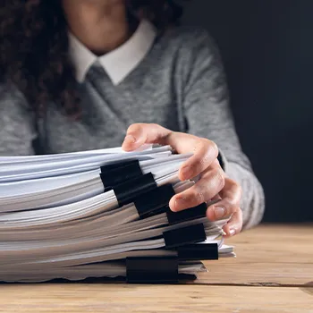 A woman organizing documents