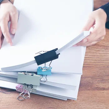 A man preparing the documents about the cost of an llc