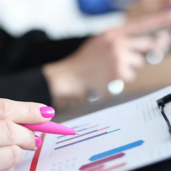 Close up image of woman analyzing business graph