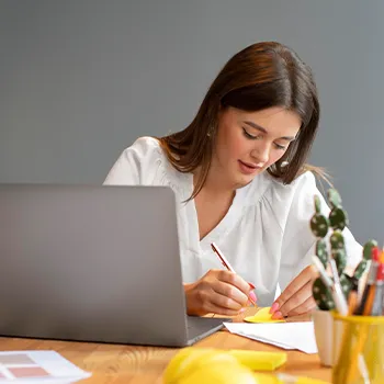 Busy businesswoman working on her table