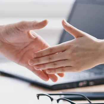 Shaking hands with a registered agent