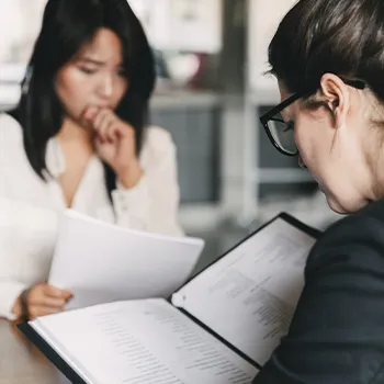 A woman reading a document