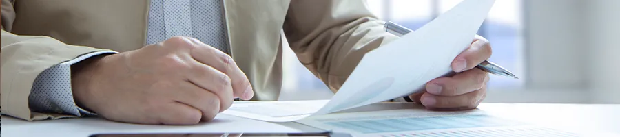 A man observing his files