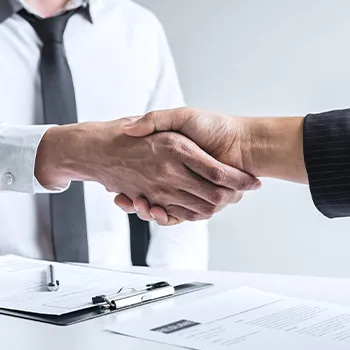 Shaking hands as an act of agreement