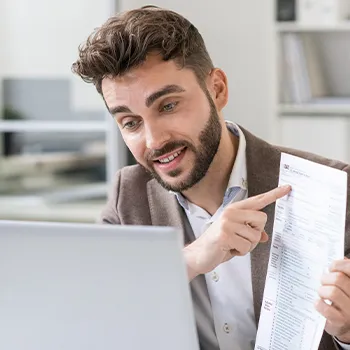 A man in a video call meeting regarding a document