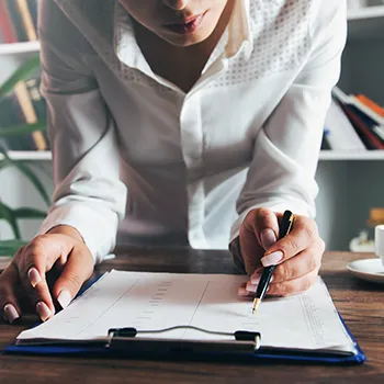 A woman registering a fictitious name