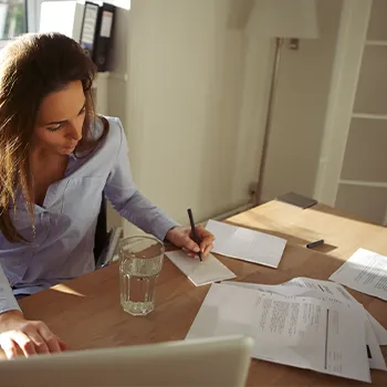 Busy woman in her office table