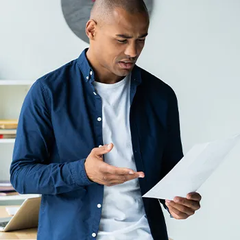 A statutory agent reading a document