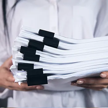 Holding a stack of files