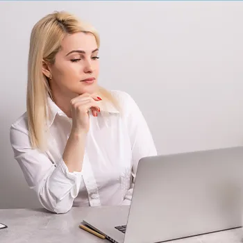 A woman performing a Washington LLC name search