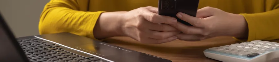 Woman using gadgets at the same time