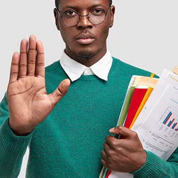 Man giving a gesture to stop or refuse