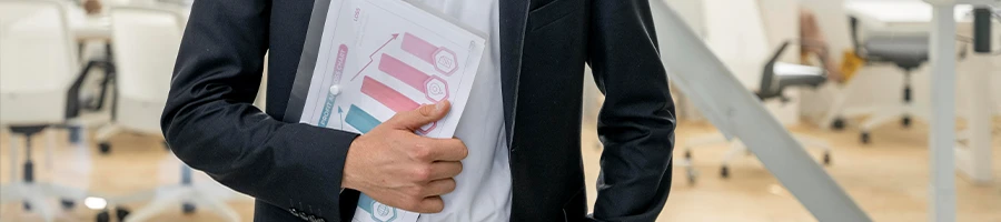 Man holding files inside a see through document