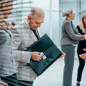 Man opening a bag of documents