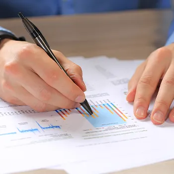 Close up image of a man working for an annual report