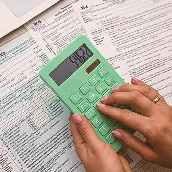 A man calculating LLC taxation for LLC with no income