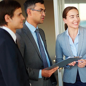 Three businessmen having a conversation