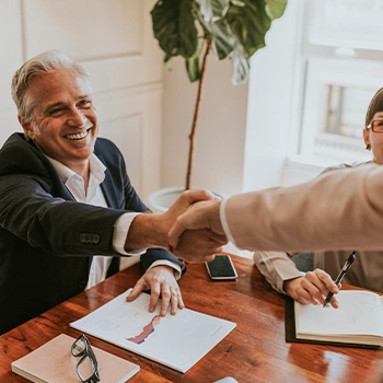 Shaking hands with a newly hired registered agent