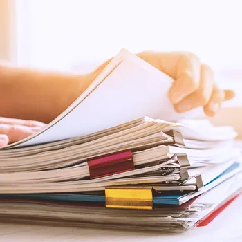 Holding a stack of file on table top