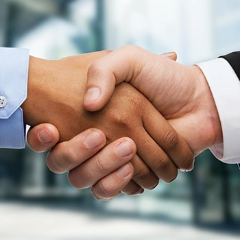 Close up image of 2 persons shaking hands