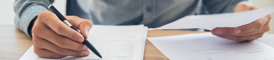 A man filing a certificates and documents