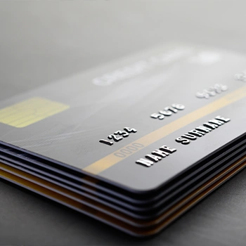 A neatly stacked bank cards