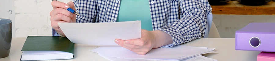 A woman studying how to dissolve an LLC in Connecticut