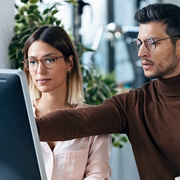 Two people looking up 3 places of restrictions on distributions and transfers