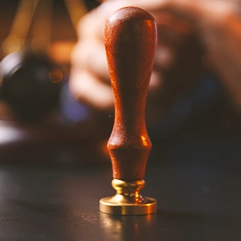 A wooden seal on a table