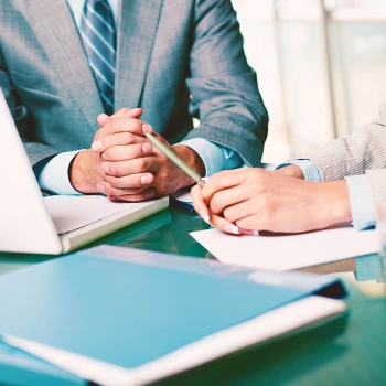 Two office workers discussing