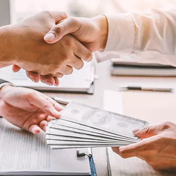 Two people shaking hands