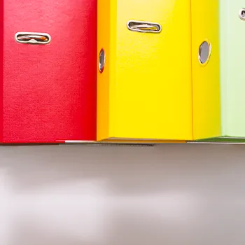 A row of documents on a table