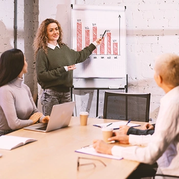 A group of employees discussing the advantages of an LLC