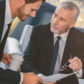 Two businessmen discussing together