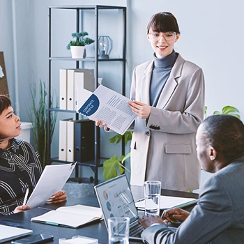 Three businesspeople discussing about appointing a registered agent