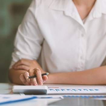 An office worker using a calculator