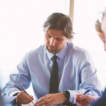 A man calculating how much does it cost to dissolve an LLC in Mississippi