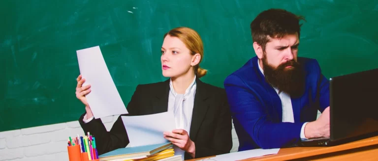 A couple studying LLCs co-owned by spouses